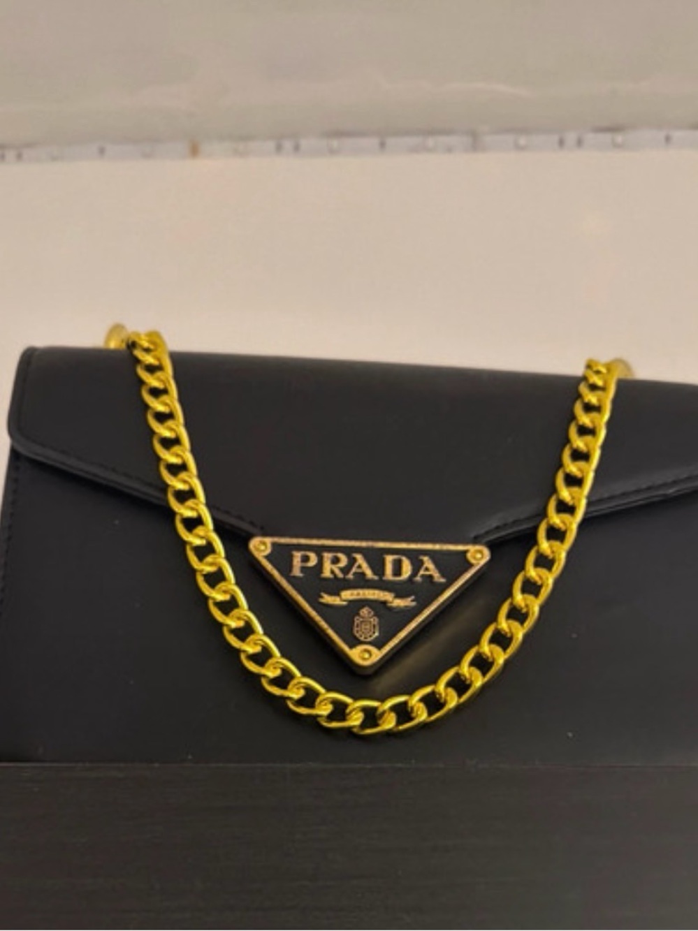 Prada Black Leather Card Holder with Gold Chain and Logo Plaque